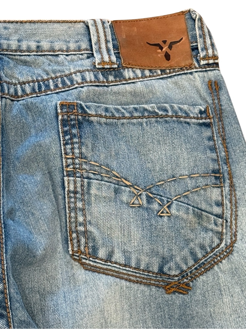 Wrangler Light Blue Relaxed Fit Men's Jeans with Leather Patch